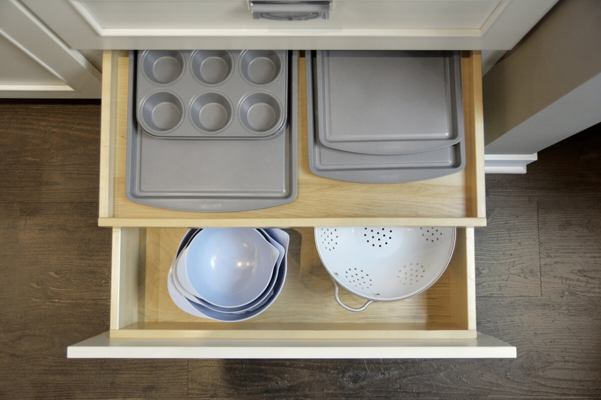 Roll-outs can be incorporated inside a drawer to create an added level of organization.