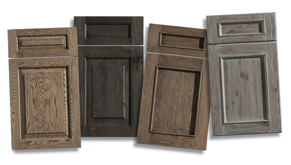 A collection of Weathered wood cabinet doors with a beautiful distressed wood finish from Dura Supreme Cabinetry.