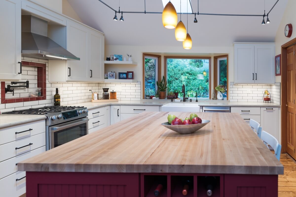 White and barn red color palette in a modern farmhouse kitchen design.