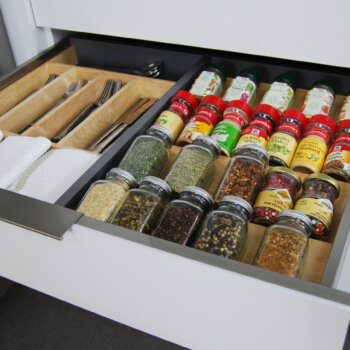 Dura Supreme's wood Drawer Spice Rack can be used in combination with our stainless steel drawer options.