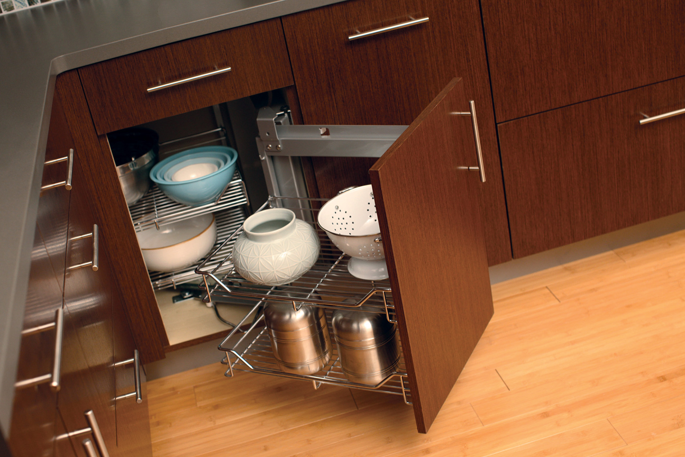 Dura Supreme Swing-out basket storage for corner cabinets.