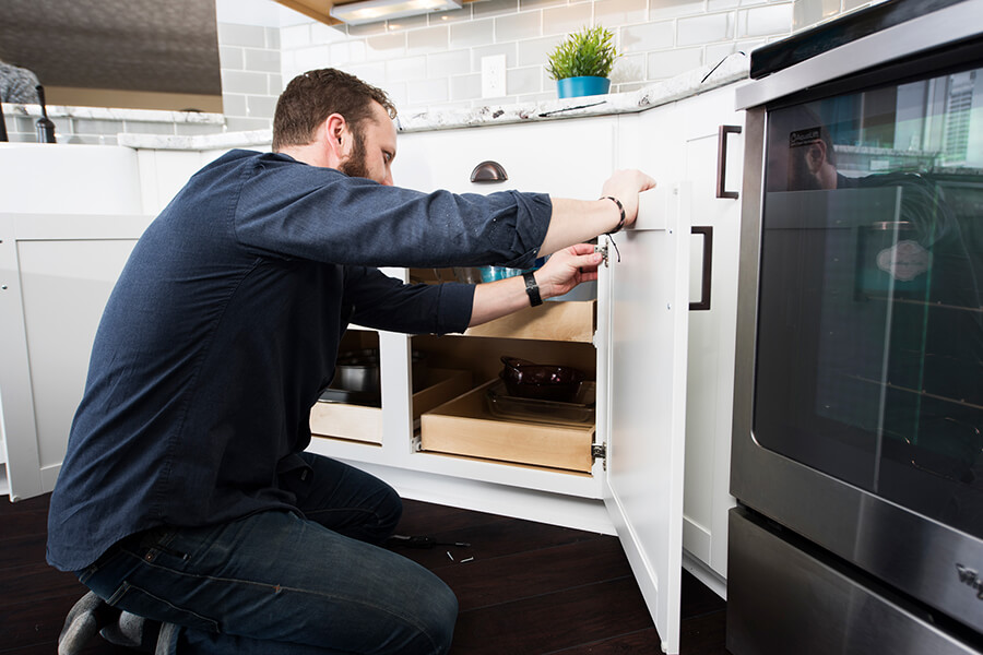 Learn how to adjust cabinet doors and drawers and install Dura Supreme Cabinetry. This homeowner is adjusting the cabinet doors to align beautifully throughout the kitchen. See our adjustment and install how to videos. Photo credit to Emergent Construction, Indiana.