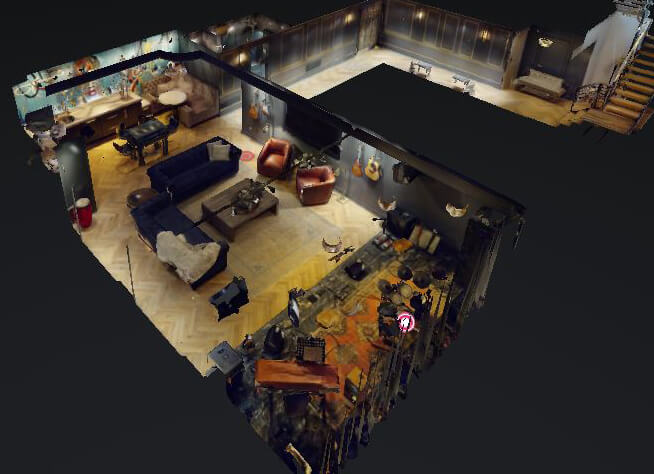 A 3D dollhouse view of the remodeled basement with music stage, home bar, game room, and entertainment room.