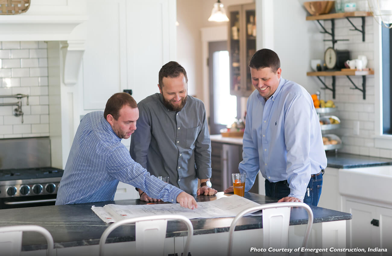 Coordination with the team of workers who will be performing your remodel is important to ensure you coexist well with them for the duration of the project. Here the kitchen designer, contractor, and homeowner are working together in the kitchen & bath showroom to schedule and plan the process of a new kitchen remodel project.