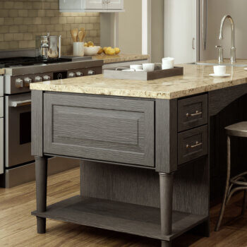 A table-like kitchen island with dark stained weathered wood and an open floor shelf framed by two furniture style turned posts of your choice.