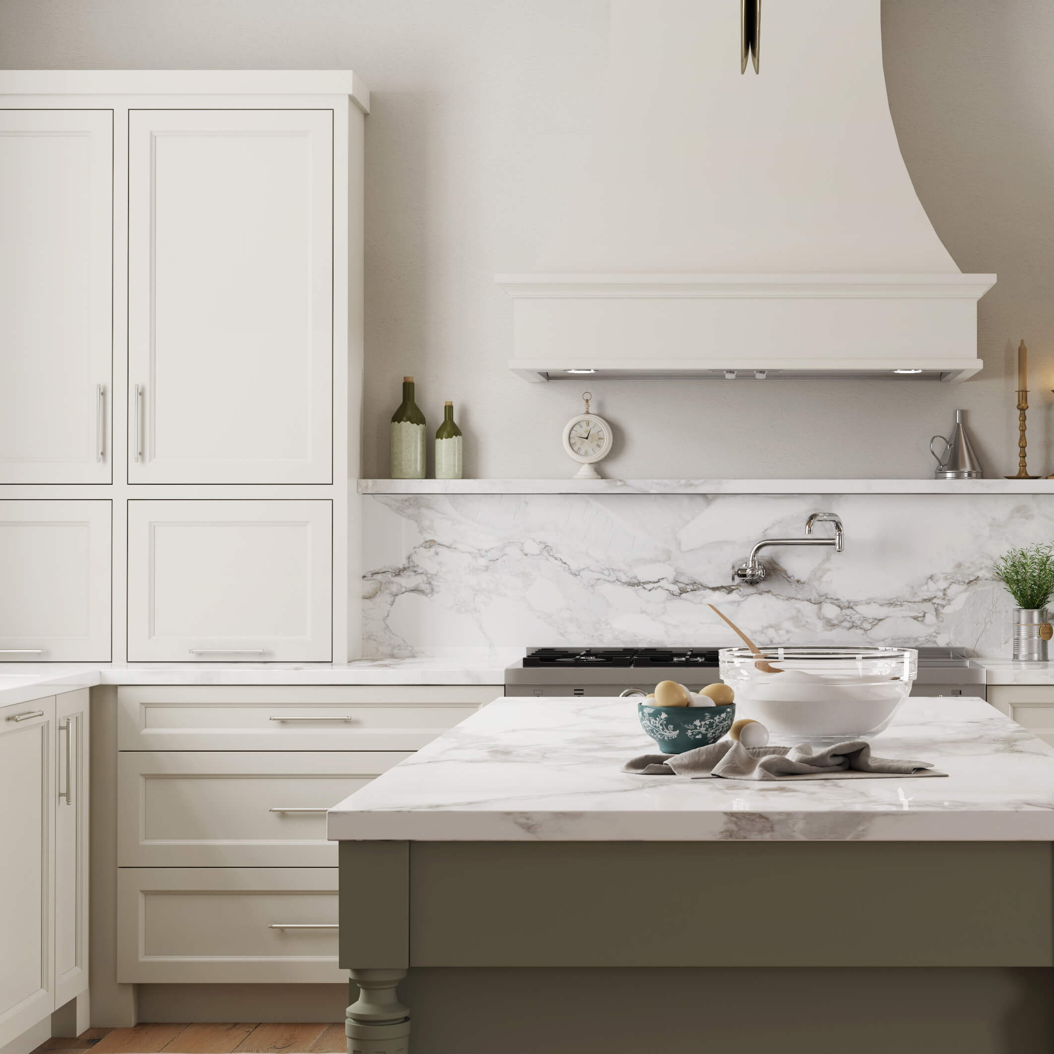 A beautiful kitchen with off-white muted white cabinets with the new trendy door style.