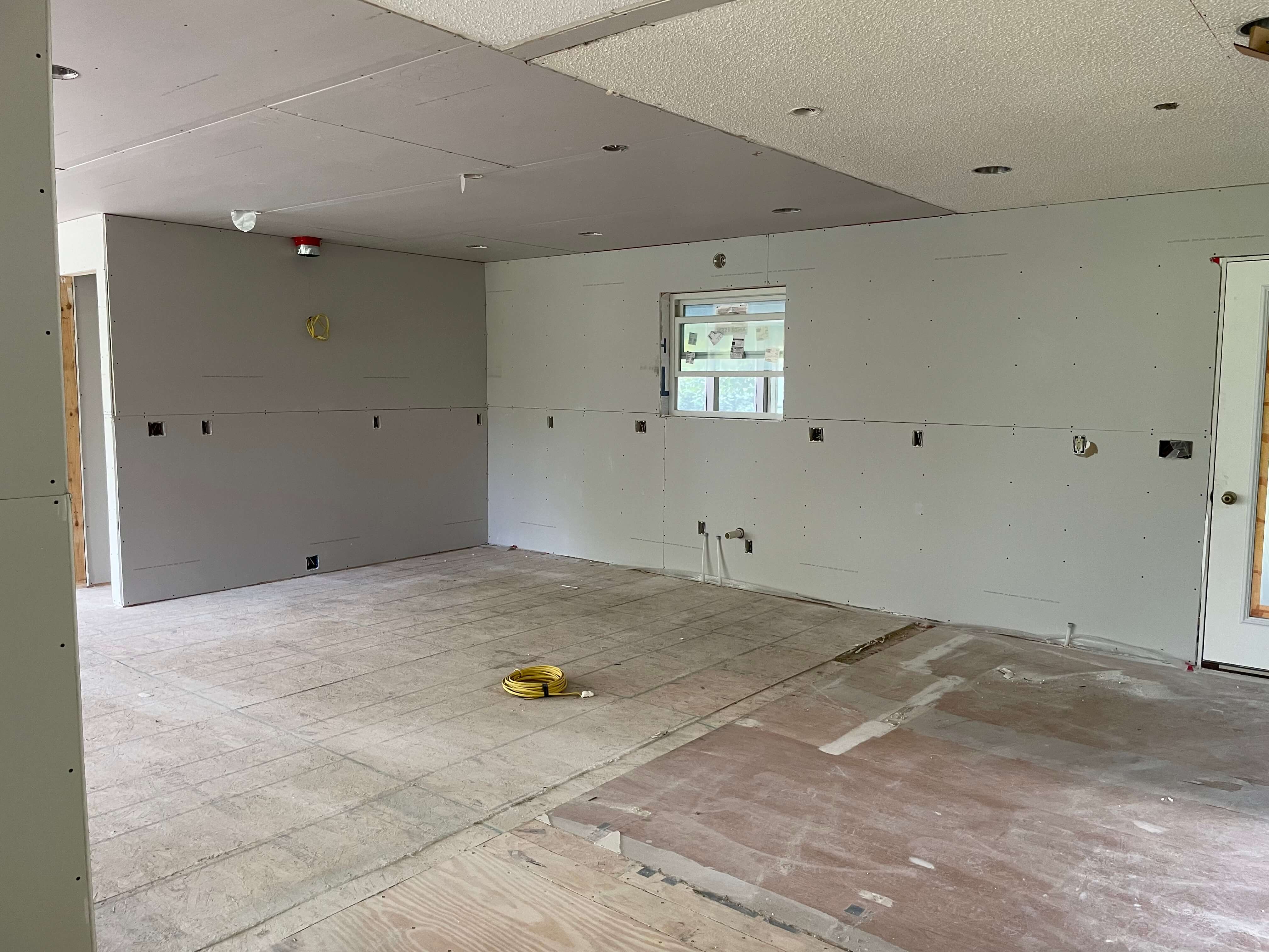 The new drywall during the renovation and addition to the home.