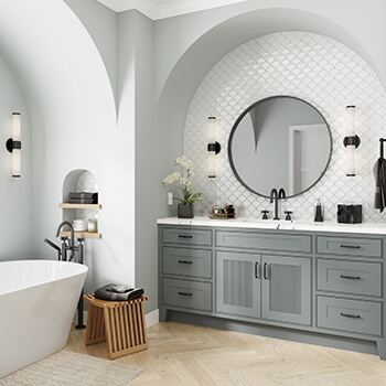 A classy bathroom design with reeded cabinet doors on the vanity.
