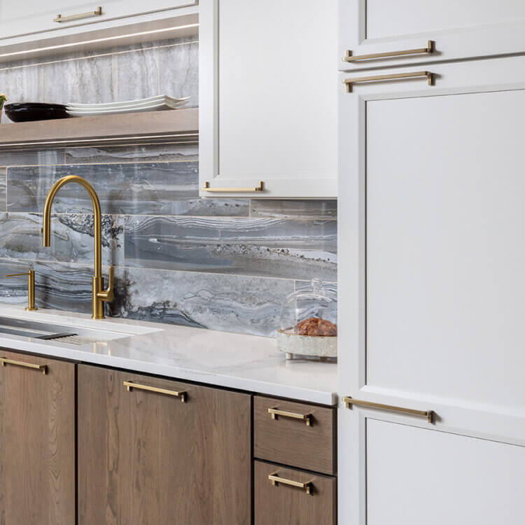 Two different cabinet door styles mixed in the kitchen design.