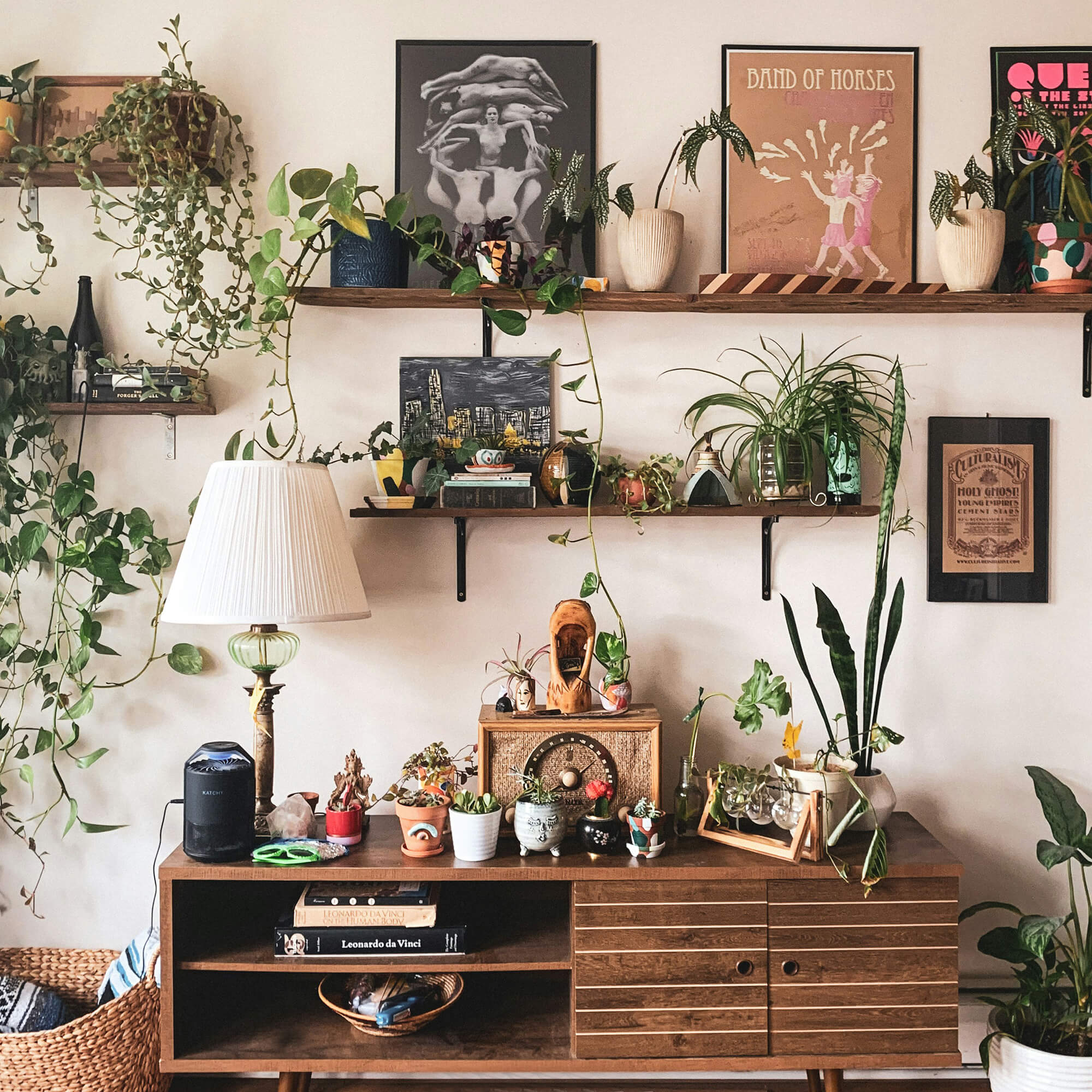 An example of a Luscious Biophilic with Mid-Century styled furniture & decor. 